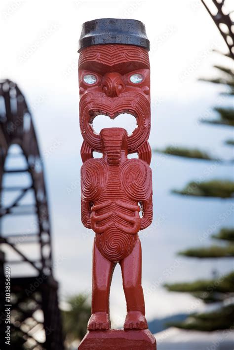 Traditional Maori carving sculpture of a man in Rotorua park, North ...