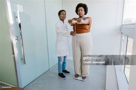 Body Weight Using Bioimpedance Scale Bioimpedancia High-Res Stock Photo - Getty Images