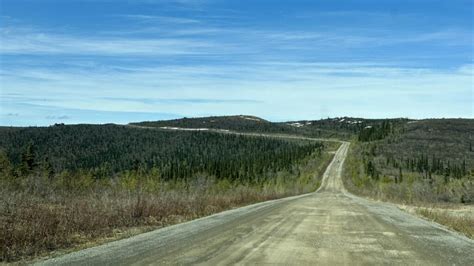 How to Safely Drive the Top of the World Highway - Getaway Couple