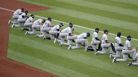 MLB Opening Day: Yankees, Nationals players kneel before national anthem