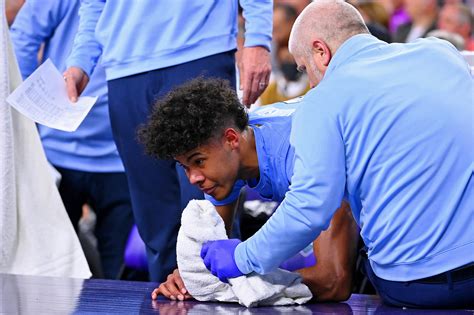 North Carolina's Puff Johnson collapsed, vomited on court