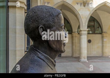 A statue of Walter Tull in courtyard of Northampton Guildhall; a ...