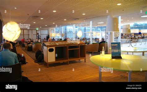 COPENHAGEN, DENMARK - JUL 06th, 2015: Airport interior inside a business lounge with seating ...