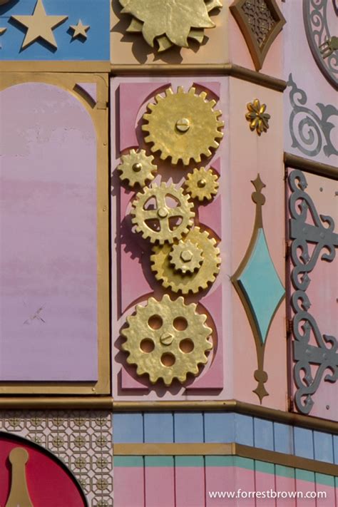 Three gears form a hidden Mickey on the outside of It’s a Small World.