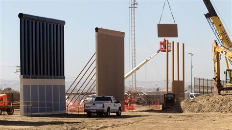 30-Foot Border Wall Prototypes Erected In San Diego Borderlands : NPR