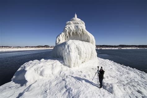 Fierce winter storms cause surreal ice formations in Michigan - AOL