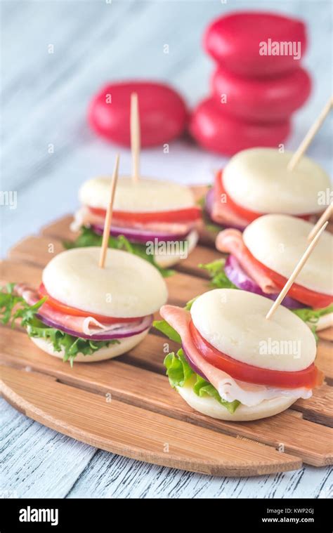 Mini cheese and prosciutto sandwiches Stock Photo - Alamy