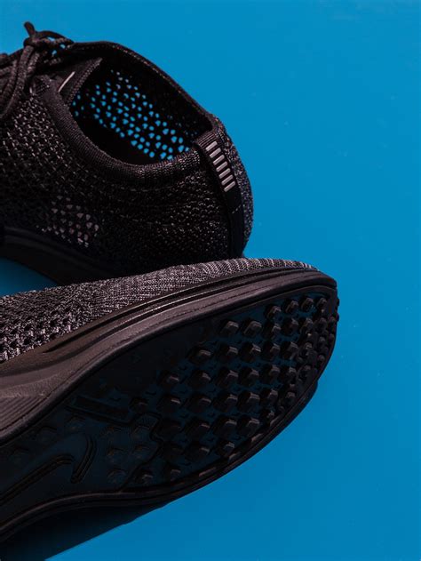 Nike's Flyknit Racers Are the Latest Sneakers to Jump On the Blackout | GQ