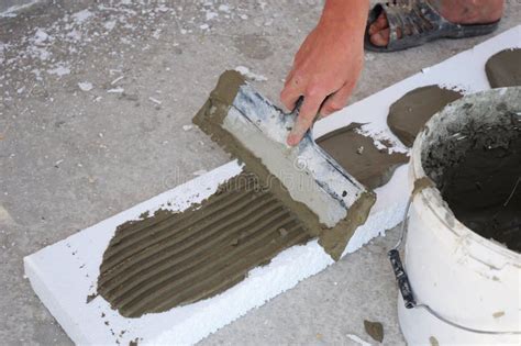 Foam Insulation Board. Worker Install Foam Board with Concrete Stock Image - Image of repair ...