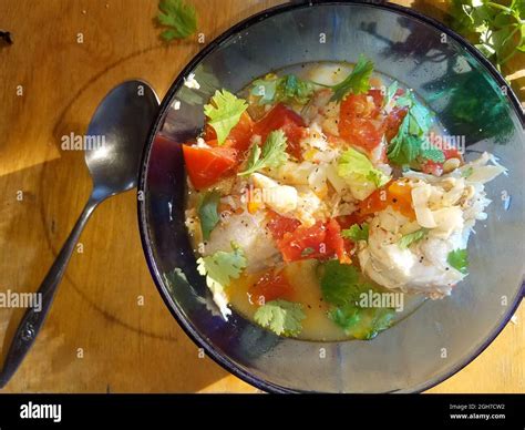 Mexican Lenguado Fish Stew Taco With Raw Salsa Verde Stock Photo - Alamy