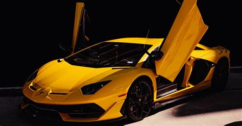 A Yellow Lamborghini Aventador on Display · Free Stock Photo