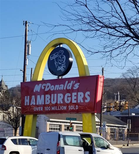 The McDonald's near me still has the single golden arch sign : r/nostalgia