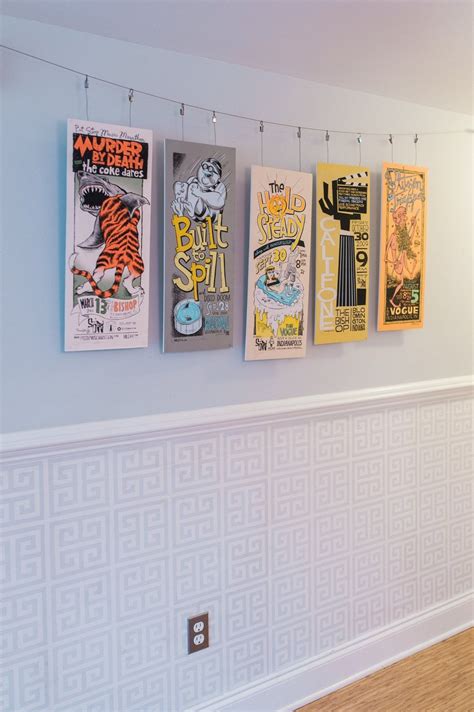 Band poster display | apartment therapy | Katie & Patrick's Renovated ...