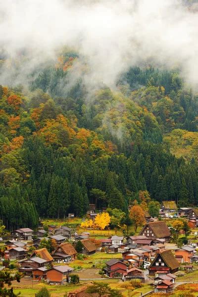 Beautiful country in japan with mist and mountain Stock Photo by ©ryanking999 8573077