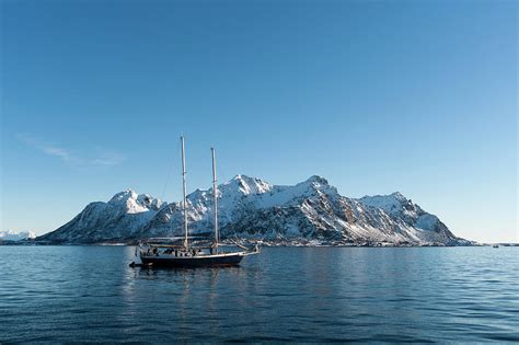 Ship Sailing In Front Of Snow Capped Mountains, Svolvaer, Lofoten Islands, Norway Digital Art by ...