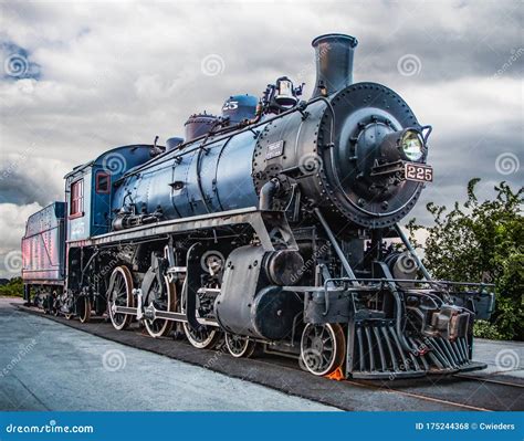 Blue Steam Locomotive on a Cloudy Morning Stock Photo - Image of bushes, antique: 175244368