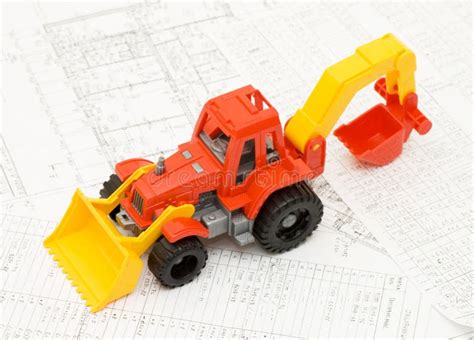 Toy Yellow Tractor on Projects Stock Image - Image of machine, power: 13922173