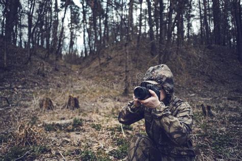 Wildlife Photographer in the Forest with a Camera Stock Photo - Image of camouflage, concept ...