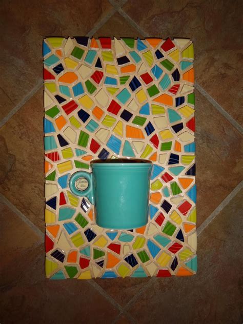 This guy has an Etsy site. Makes these from broken Fiestaware.....I like it. Mosaic Tile Art ...