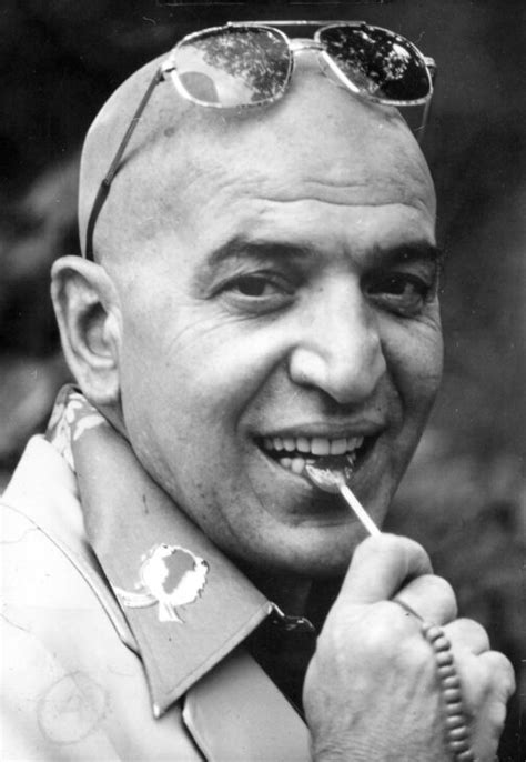 Telly Savalas with a lollipop as Kojak | Who2