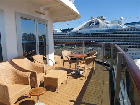 The Westerdam Deluxe Verandah Suite SB8147 is a cabin on the back corner of the ship. It has a ...