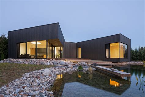 Casa no Rio Nevezis / Nebrau | ArchDaily Brasil