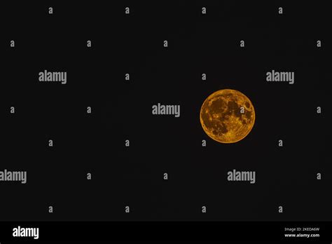 Full Yellow Moon in the Night Sky Stock Photo - Alamy