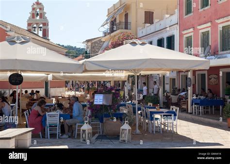 Gaios town centre restaurants and bars, Paxos, Greece Stock Photo - Alamy