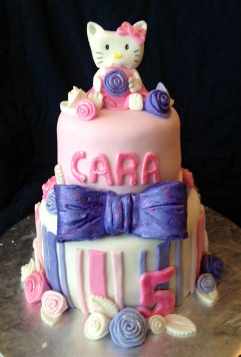 Hello kitty tiered cake pink purple girl birthday | Tiered cakes, Cake ...