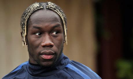 Bacary Sagna hair with long blond braids hairstyle