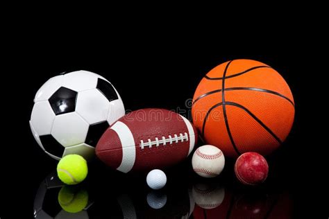 Assorted Sports Balls On A Black Background Stock Image - Image: 11481321