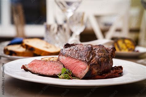 Entrecote with grilled garlic Stock Photo | Adobe Stock