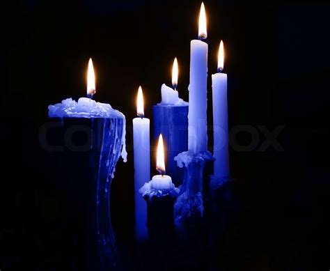 Blue Burning Candles On Black | Stock image | Colourbox