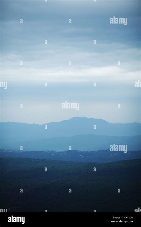 cloudy mountains landscape Stock Photo - Alamy