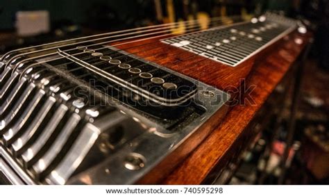 Closeup of a pedal steel guitar in the studio. - Stock Image - Everypixel