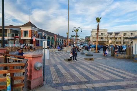 Pismo Beach Pier Plaza with Walking People, Downtown of Pismo Beach ...