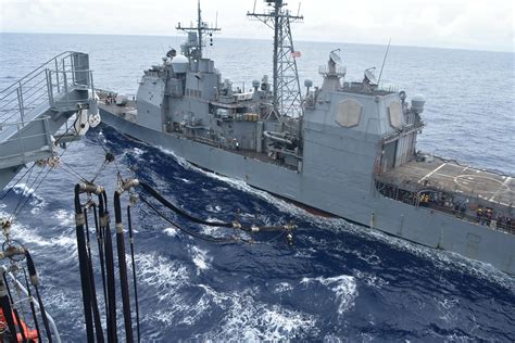 USS Antietam (CG 54) conducts underway replenishment from USNS Tippecanoe (T-AO 199) while ...