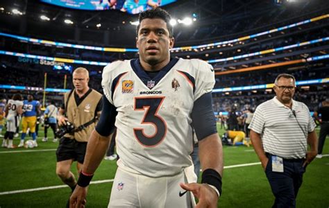 Broncos QB Russell Wilson “day-to-day” after hamstring injury Monday ...