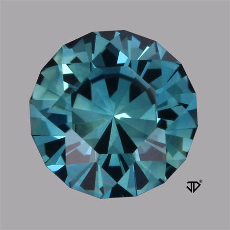 Teal Australian Sapphire SunBurst™ Cut 1.63 carats | John Dyer Gems