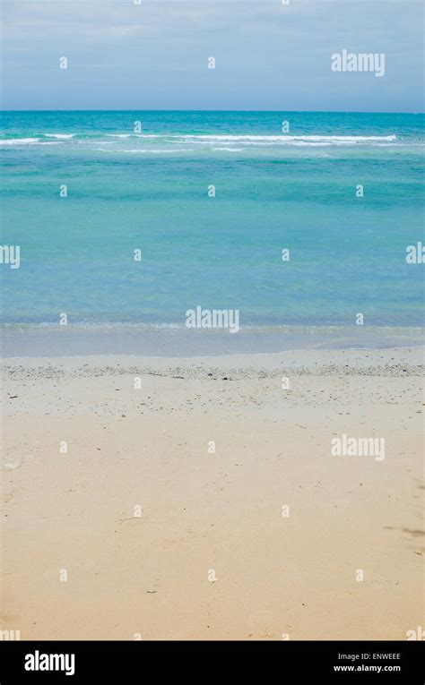 Beach sand and blue sea in Thailand Stock Photo - Alamy