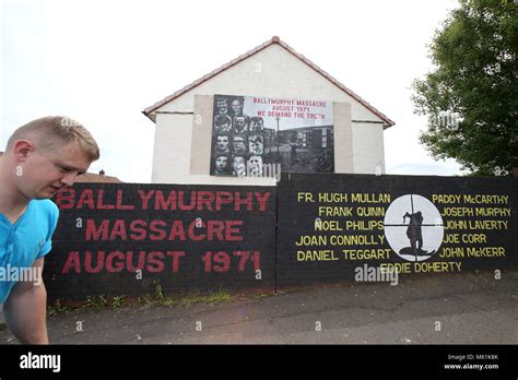 Murals dedicated to the 1971 Ballymurphy Massacre seen on a wall in ...