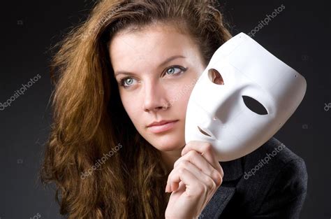 Woman with mask in hypocrisy concept — Stock Photo © Elnur_ #72087411