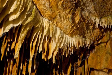 Cave stalactites and stalagmites formations limestone caves — Stock Photo © vittore #13857989