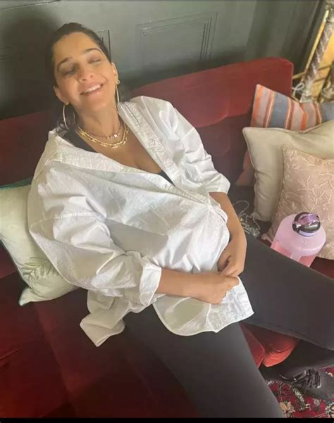 Sonam Kapoor Flaunts Her Baby Bump in an Oversized White Shirt Photos