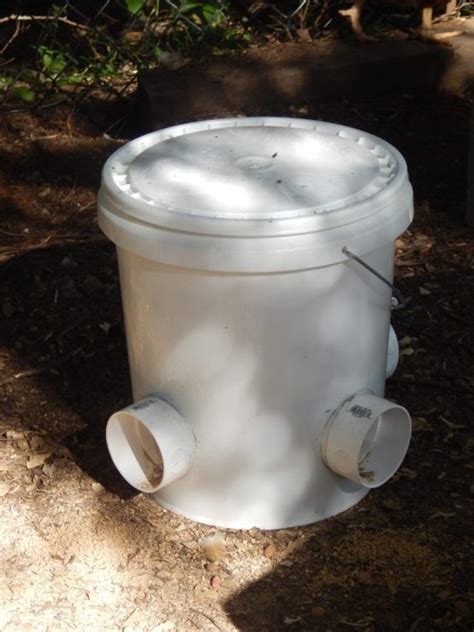 DIY Bucket Chicken Feeder (from a 5 gallon bucket!) | Far From Normal