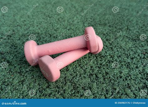 Set of Sport Accessories on Green Background. Fitness Equipment. Pink Dumbbells. Sport Gear ...