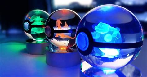 These Crystal Pokéballs Have a Glowing Pokémon Trapped Inside - Geeky