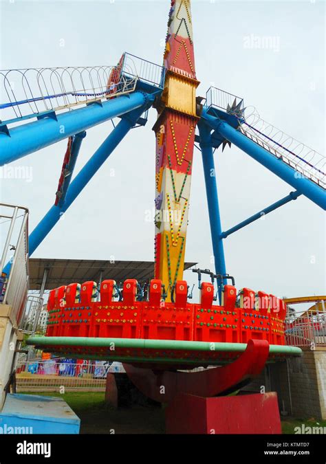 Baishamen Park amusement park frisbee ride 01 Stock Photo - Alamy