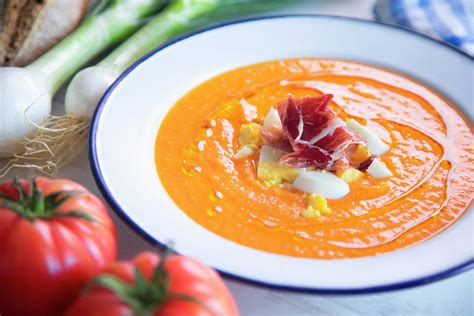 Traditional Spanish Salmorejo - Cold Tomato Soup Served With Boiled Egg, Iberico Ham And Olive ...