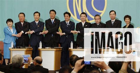 TOKYO, Japan Political party chiefs join hands before a debate on their ...